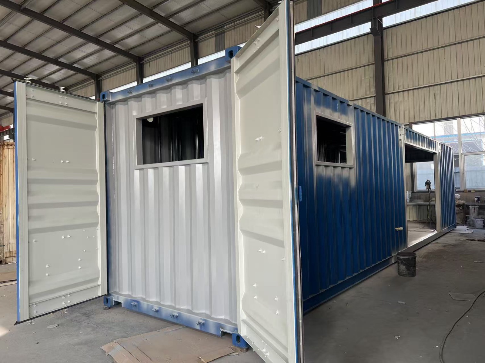 Magic Iron container homes on the production floor at our Yantai factory